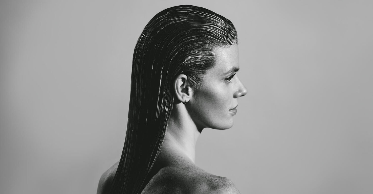 Hair Rituel by Sisley haircare model black and white
